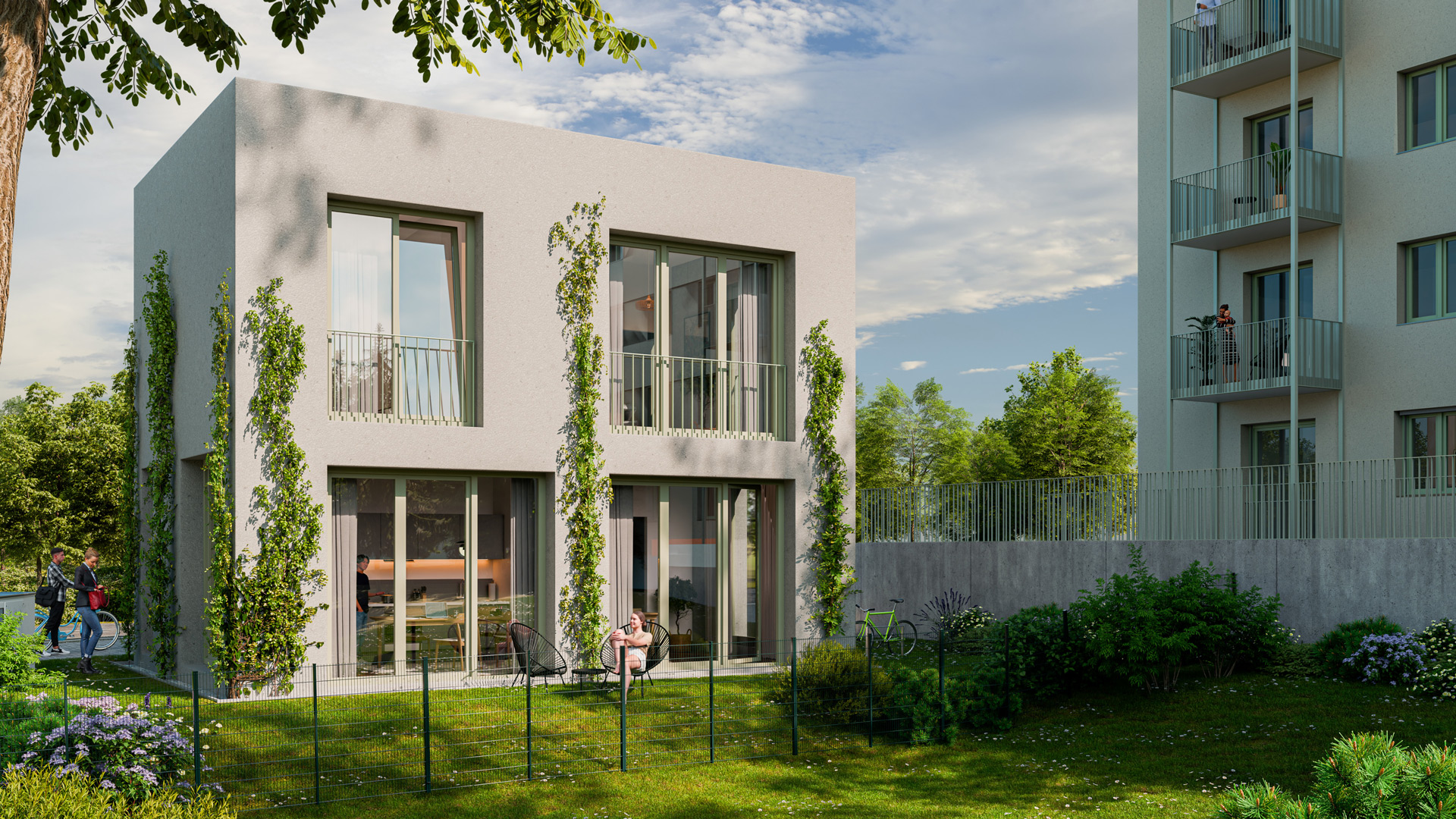 Das Bild zeigt die Gartenansicht des Atelierhauses von dem Wohnkomplex "oder" in  der Oderstraße 194 in Berlin Tempelhof. Neben der modernen Architektur ist eine junge Frau zu sehen, die im grünen Garten auf einem schwarzen Acapulco-Chair entspannt sitzt und sich sonnt.